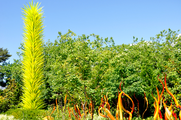 a tall yellow sculpture